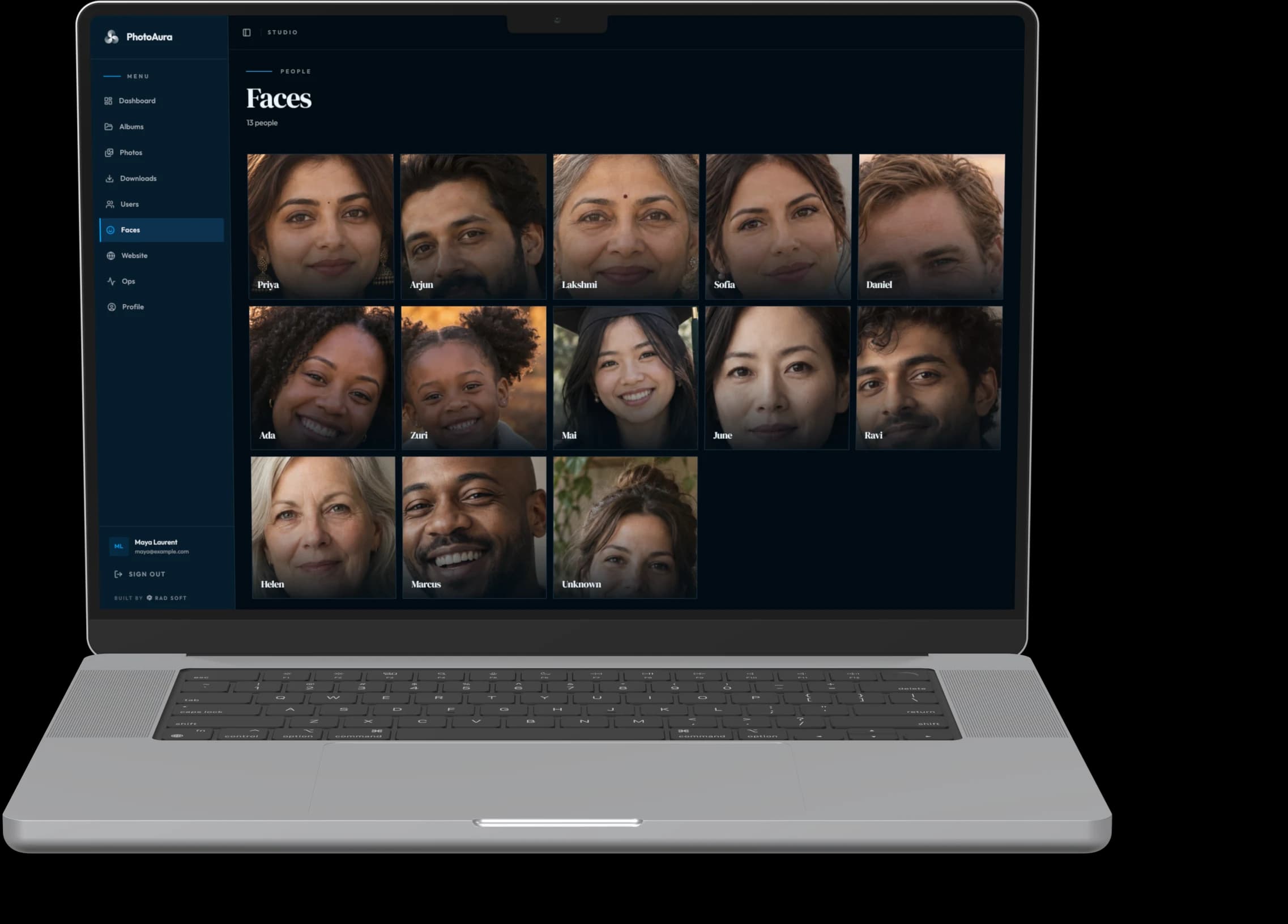 PhotoAura studio — people on a MacBook